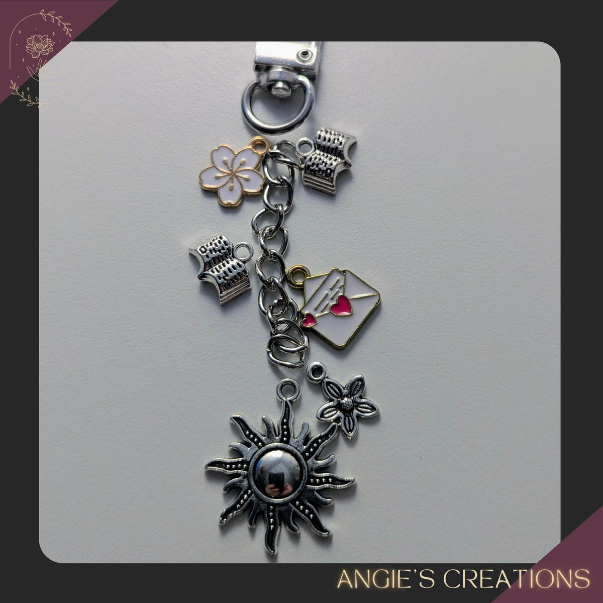 This mini Kindle charm chain is a perfect stocking stuffer or gift for readers who love books and flowers. Designed to add celestial touch to your Kindle, book sleeve, planner, tote bag, or key loop. Clips on easily and brings a bit of floral inspired magic to your reading routine. Each piece is assembled by hand in my Ottawa studio using a sturdy silver or gold clasp and chain (charms will be mixed in silver or gold), accented with 4 enamel charms, and 1 sun ending charm.