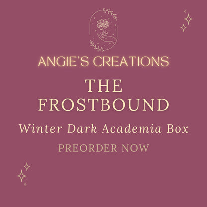 A winter, dark academia inspired reader's box for long cold nights and moody reading sessions. Standard and Deluxe tiers available, same core lineup of keychain, candle, stickers, and bookmark, with Deluxe adding a journal and bonus charm. Ready to preorder now, ships in time for the holidays.