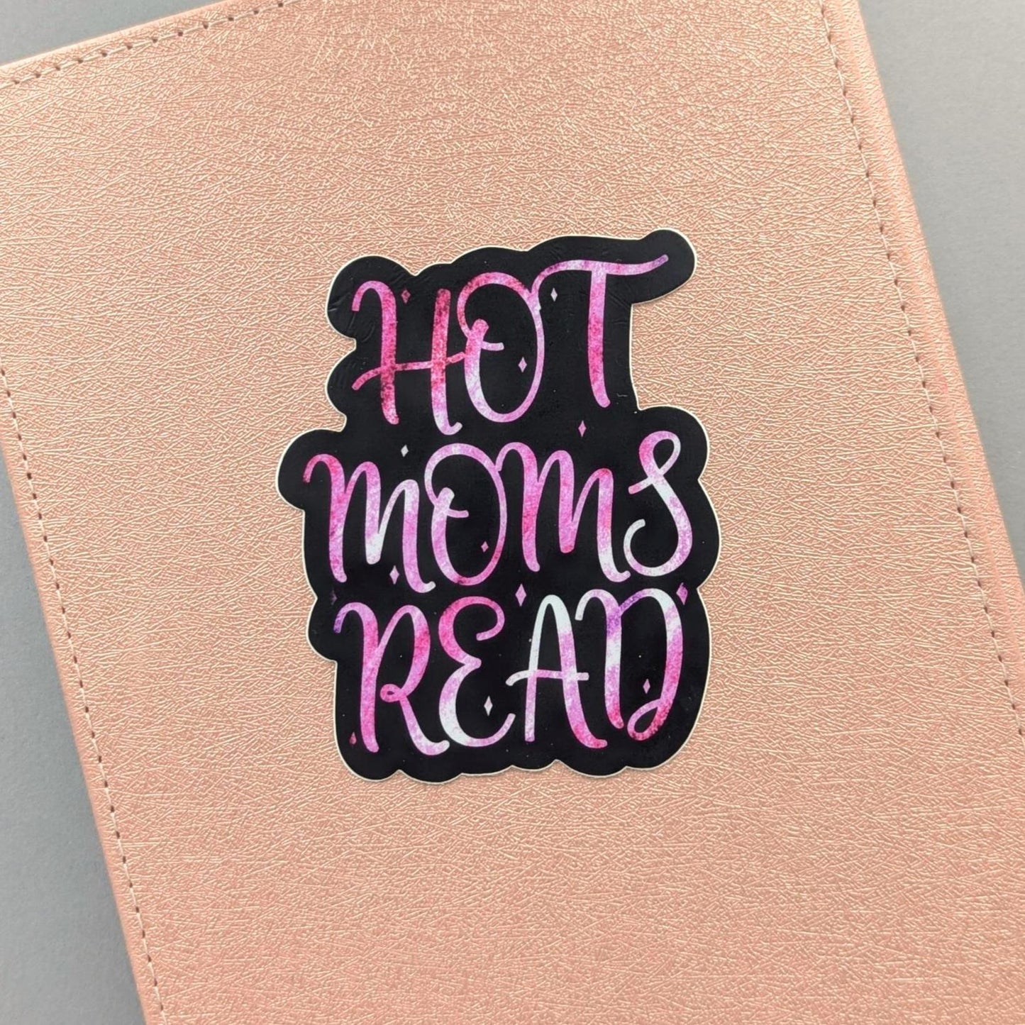 For the mom who steals moments with her books, this sticker is a badge of honor. A chic pink foil effect catches the light, celebrating your fierce love of reading and your membership in a movement of literary-loving mothers. Stick it on your laptop, water bottle, or planner as a declaration: you're a woman with dreams, stories, and a TBR pile that never ends. Because taking time for yourself isn't selfish; it's essential.