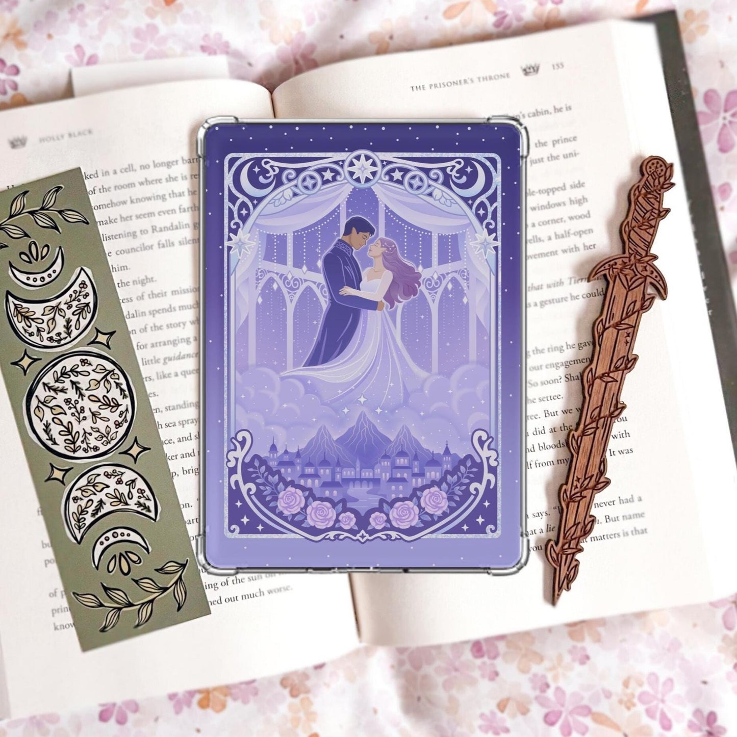 Purple and lavender laminated Kindle insert featuring an illustrated couple embracing under a starry archway with moons and stars above, roses and a moonlit city below.