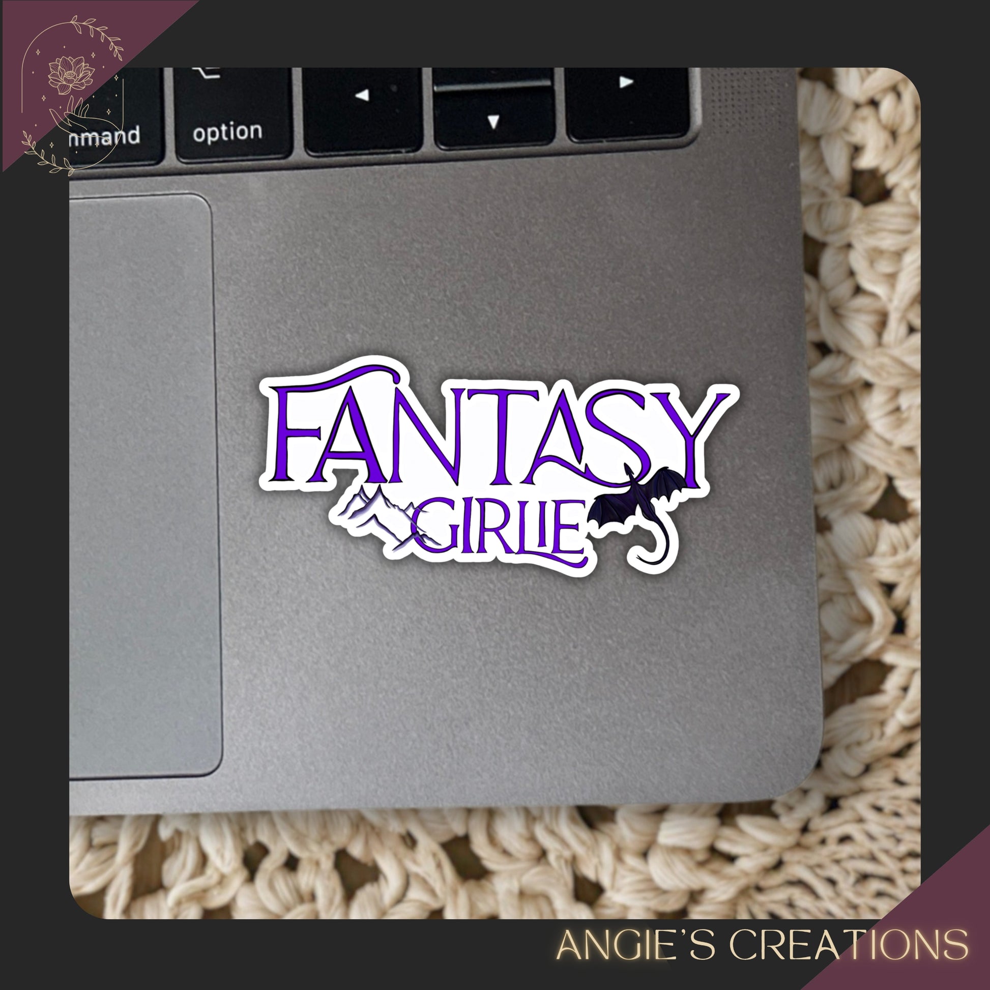 Sticker with 'Fantasy Girlie' design on a laptop trackpad, branded 'Angie's Creations'.