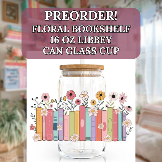 Angie's Creations preorder Floral Bookshelf 16oz Libbey glass can with bamboo lid and glass straw, featuring a single decal of a colourful illustrated row of rainbow book spines with wildflowers growing between them. Bookish cottagecore reader gift designed in Ottawa Canada.