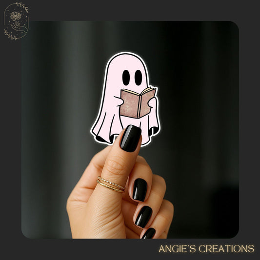 A spooky-cute companion for every book lover! 👻📖 This vinyl sticker features a ghost cozied up with a good read—perfect for laptops, journals, water bottles, or tucking into bookish mail. A must-have for readers who love a touch of whimsy and charm with their spooky season vibes.