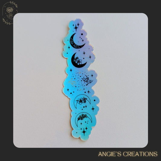 A majestic holographic moon phases design with soft lunar details, ideal for cozy bookish planners, reading journals, and dreamy night sky lovers. Celestial moon phases design inspired by Tairn &amp; Andarna dragons and fourth wing.